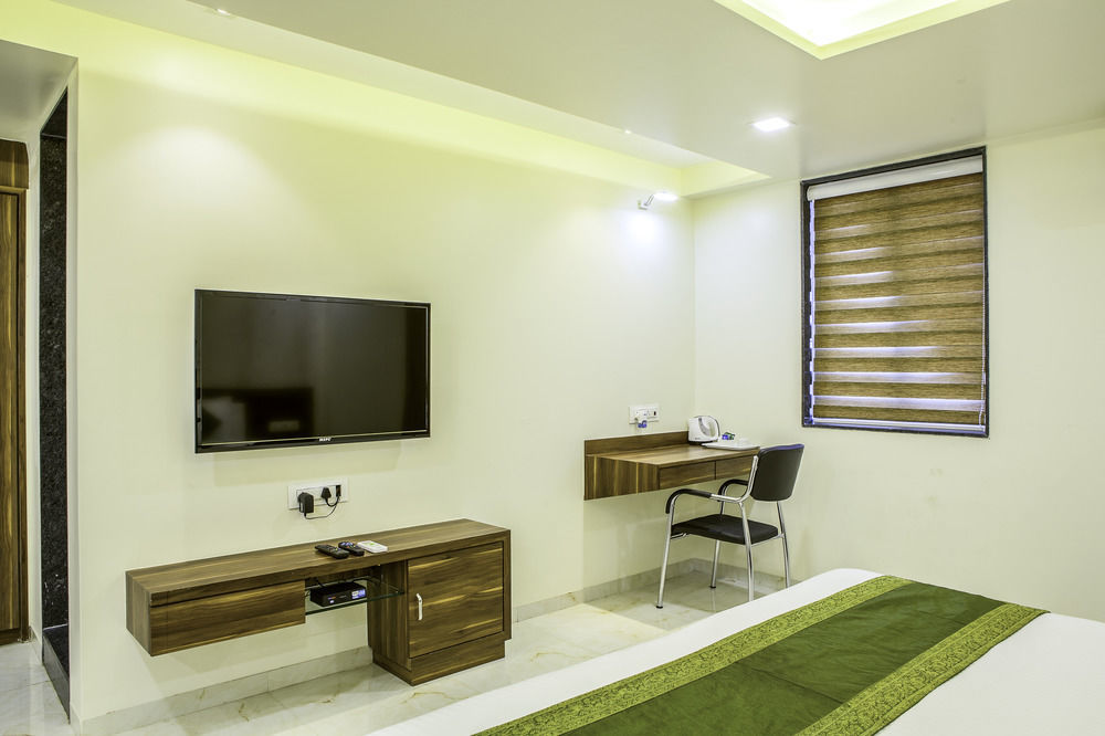 Отель Treebo De Grandeur Anand Nagar Тхане Экстерьер фото