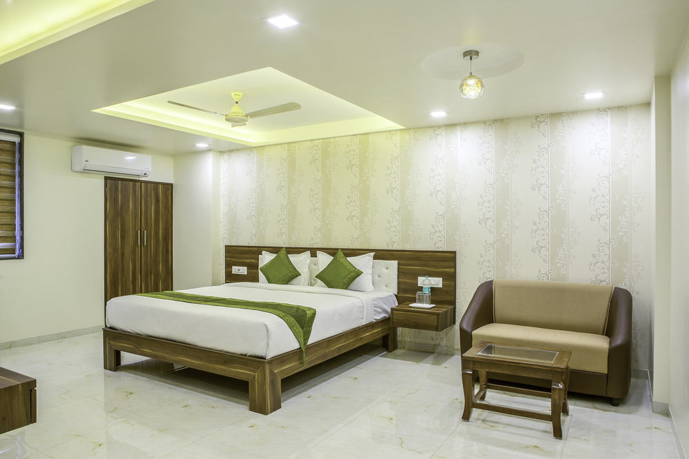 Отель Treebo De Grandeur Anand Nagar Тхане Экстерьер фото